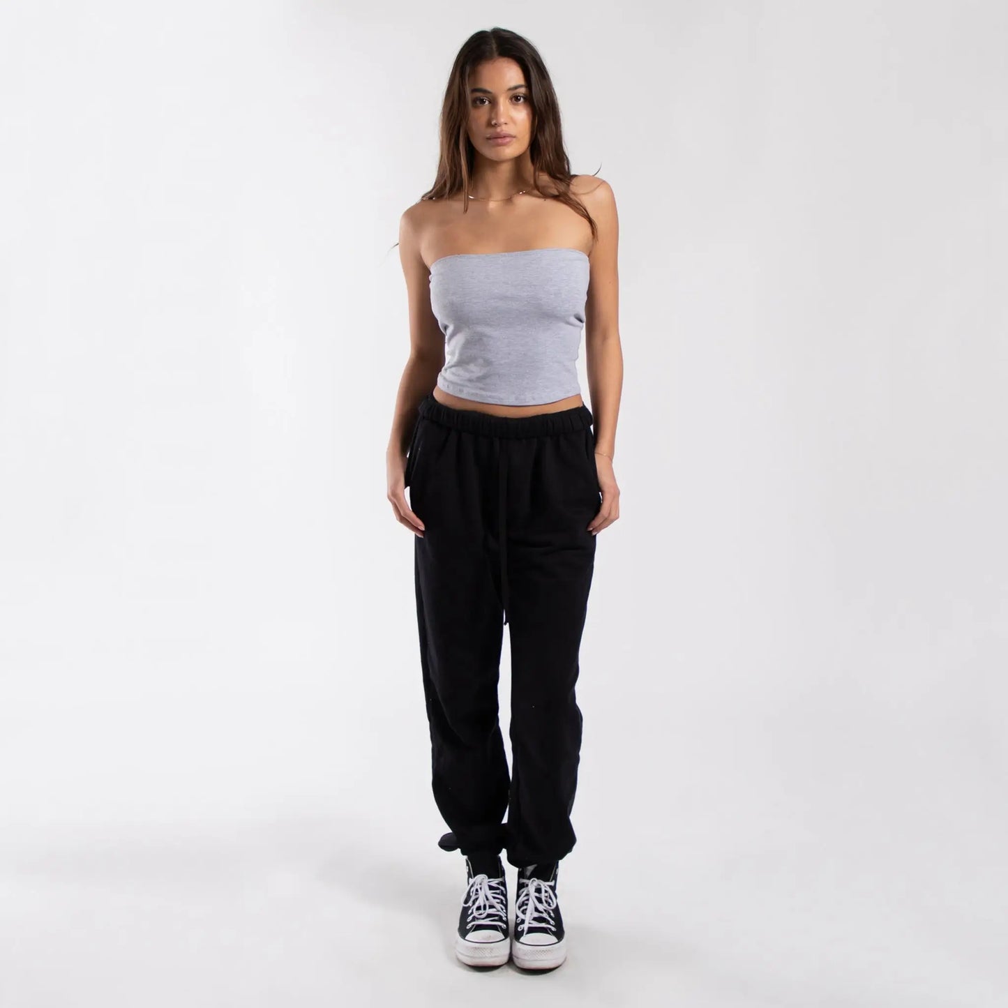 Black jogger pants with drawstring waist and elastic cuffs for women’s casual wear
