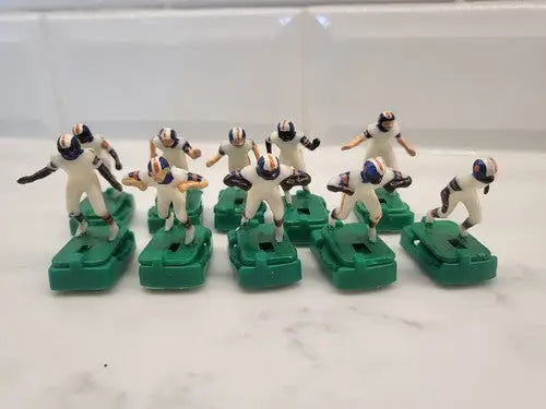Vintage Denver Broncos Electronic football game figures in white uniforms with stands