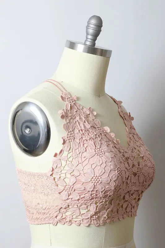 Pink floral lace bralette on mannequin featuring Crochet Daisy Longline design