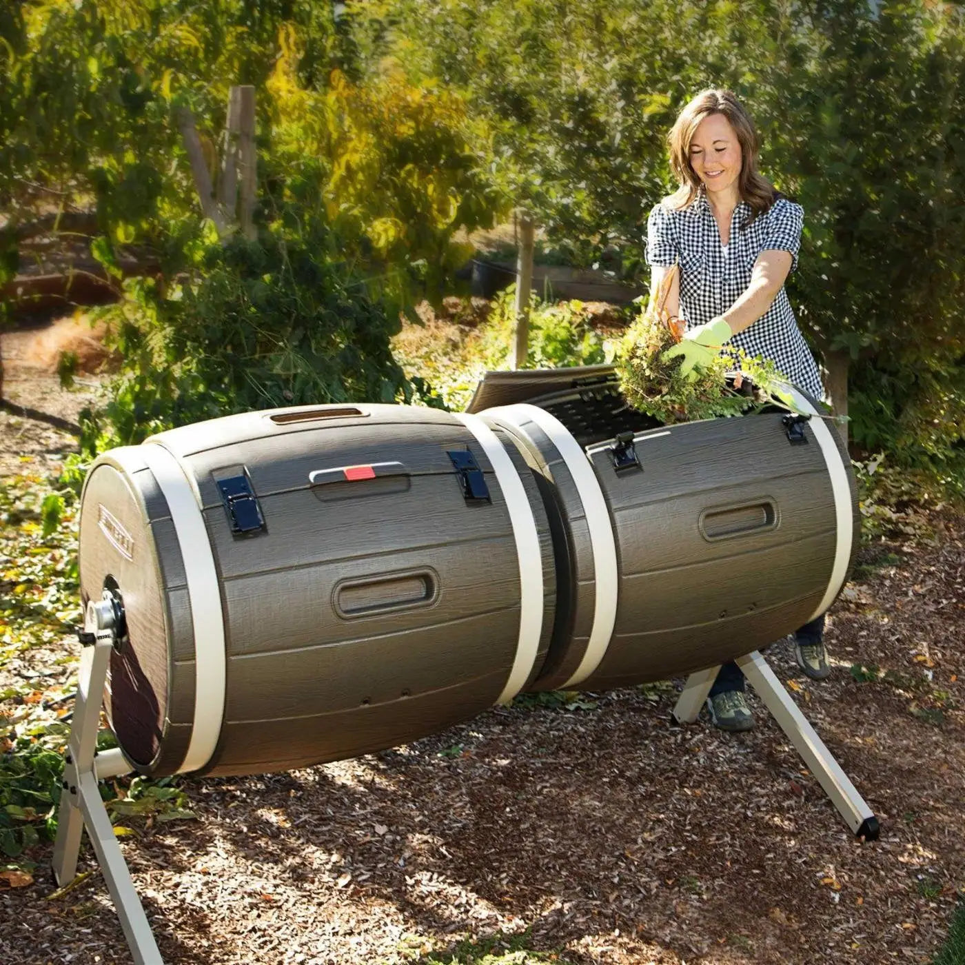 100-Gallon Compost Bin Tumbler with black and silver accents, durable high-density polyethylene construction, double rotating composter with internal aeration