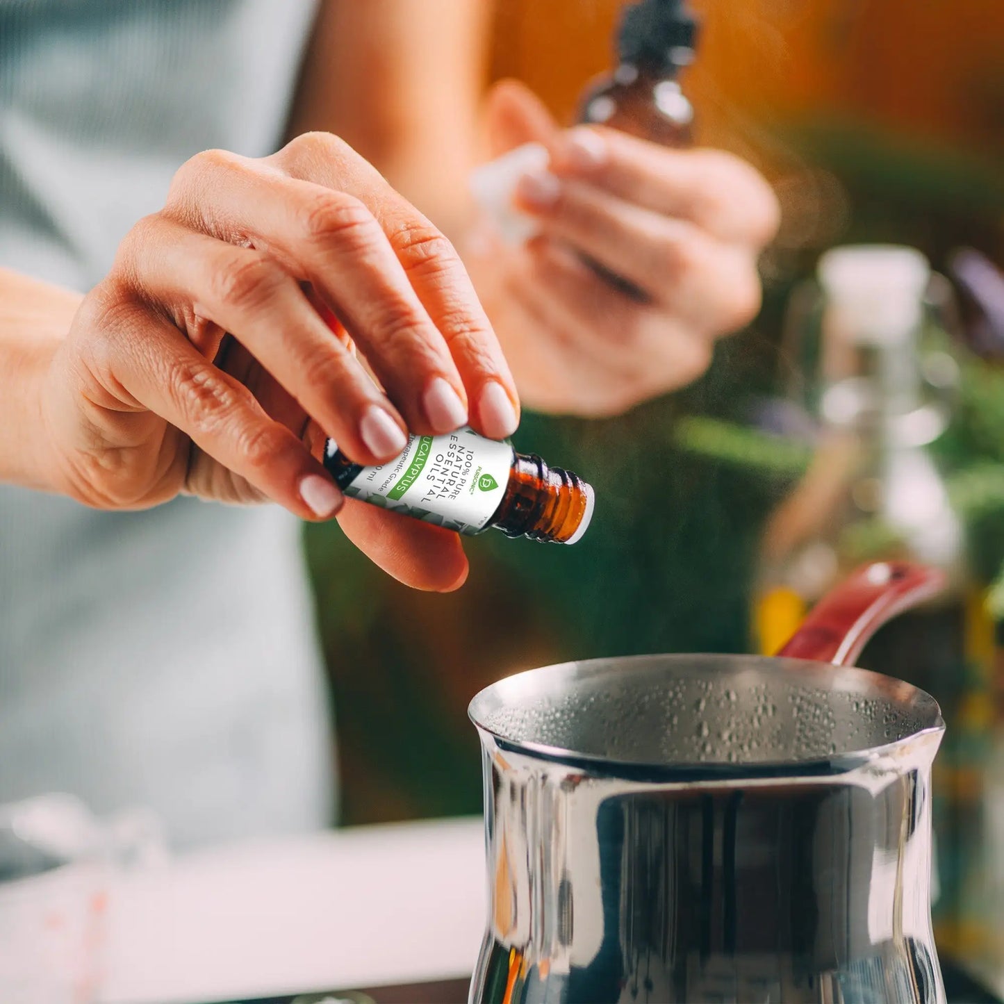 Lavender essential oil bottle with dropper cap and green label for natural eucalyptus essential use
