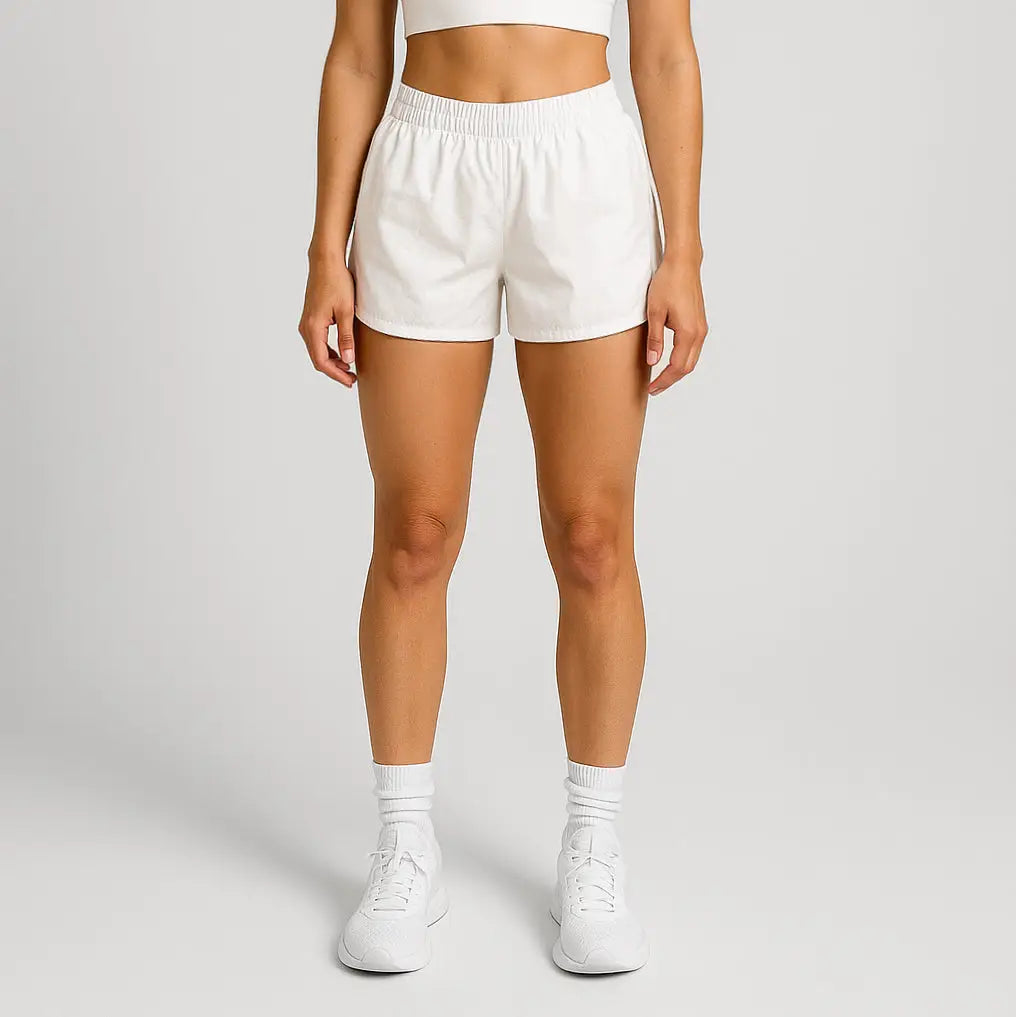 White women’s athletic shorts with elastic waistband and drawstring for activewear