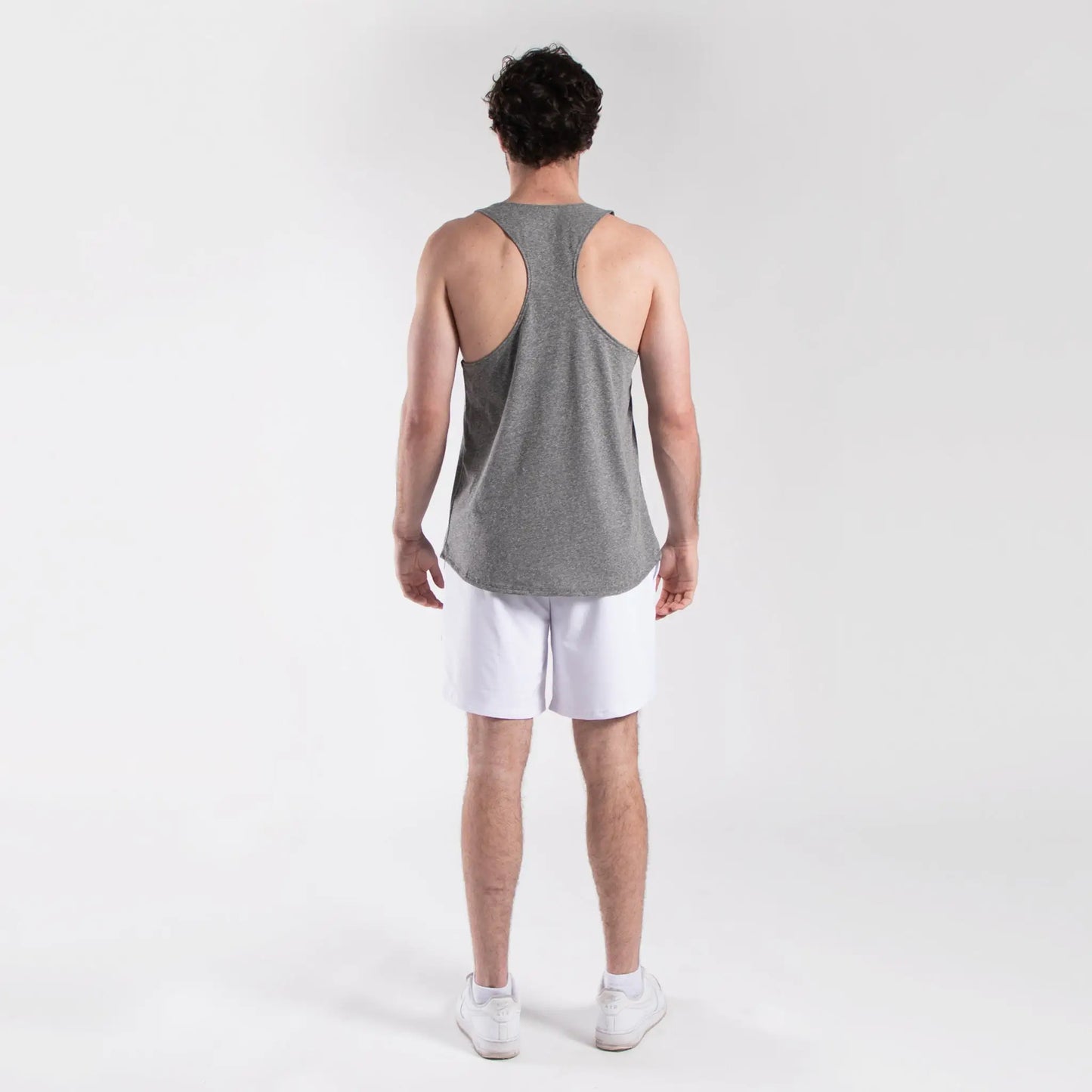 Gray heathered tank top with racerback design paired with Men’s Athletic Shorts