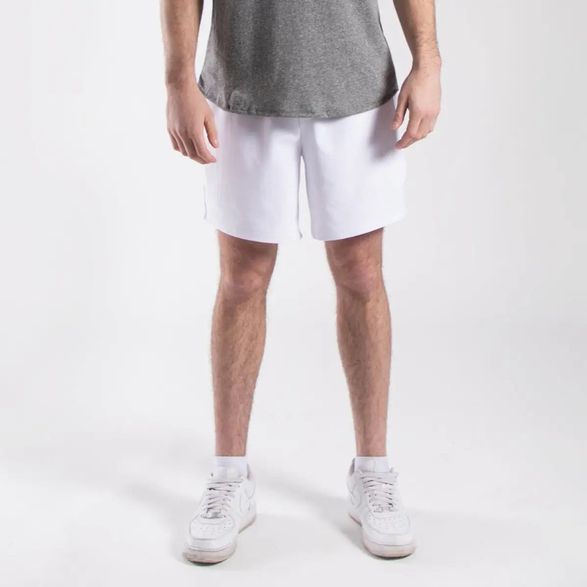 White men’s athletic shorts with drawstring and side pockets perfect for workouts