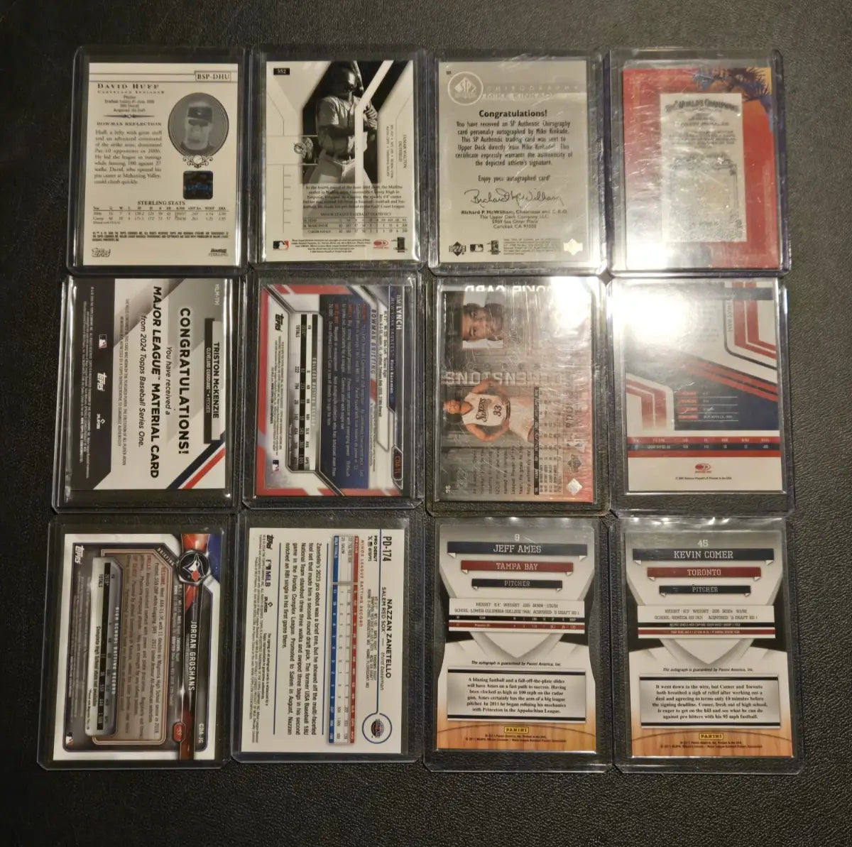 12x baseball basketball auto relic card lot with protective sleeves for collectors