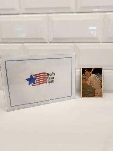 Trading card featuring Hank Bauer in protective case from 1957 Topps Hank Bauer collection