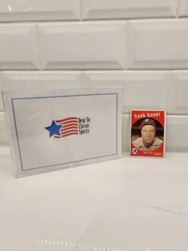 Classic 1959 Topps Hank Bauer baseball trading card in protective case suitable for collectors