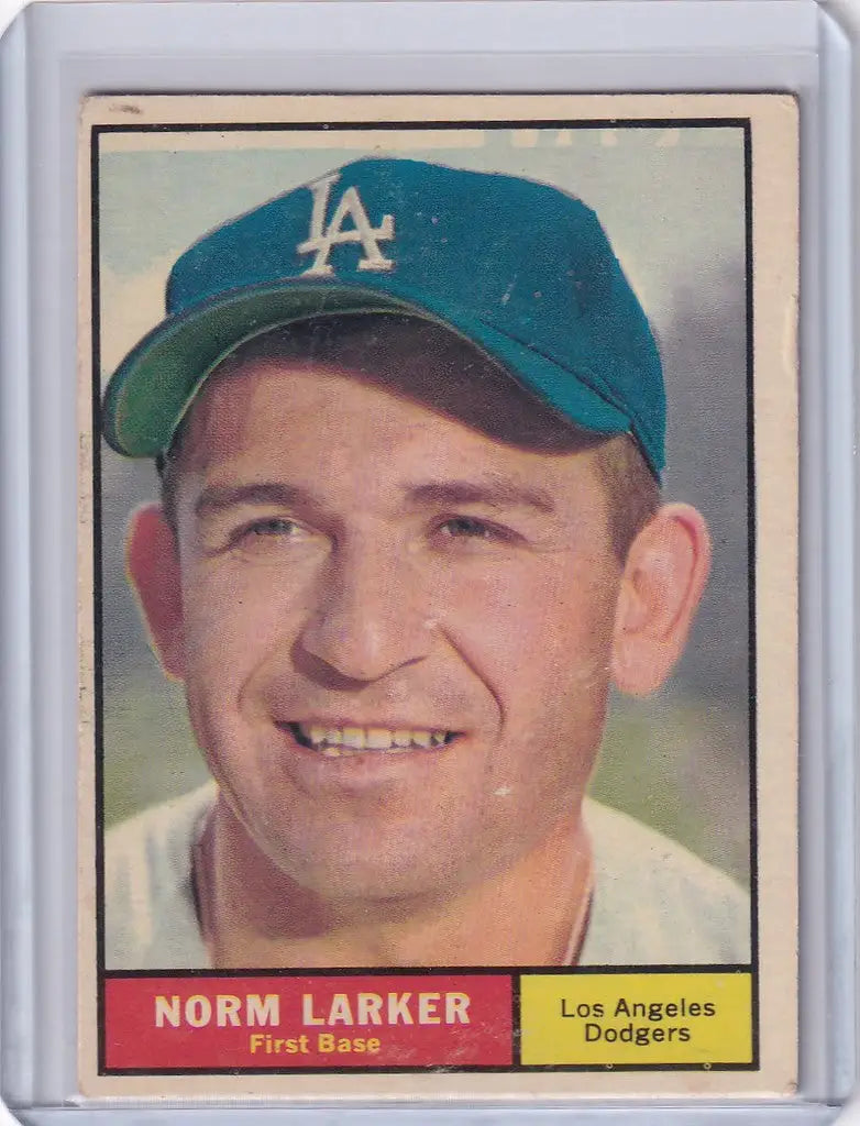 Baseball card of Norm Larker smiling in a Los Angeles Dodgers cap, 1961 Topps #130