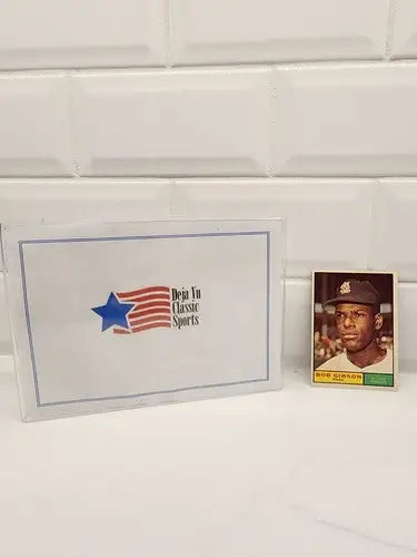 Baseball card featuring Bob Gibson in protective case for trading card collectors
