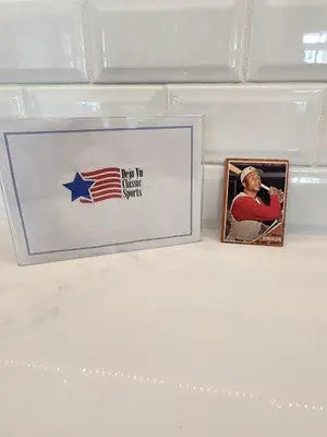 Baseball card and box from 1962 Topps Frank Robinson series featuring Frank Robinson