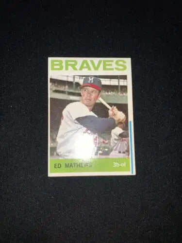 Ed Matthews baseball card from 1964 Topps blue line version print error variation