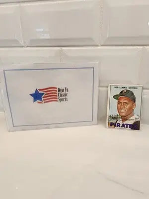Baseball card featuring Topps Roberto Clemente and company logo from 1967 Topps Roberto Clemente #400