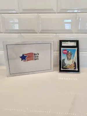Framed 1969 Topps Roberto Clemente #50 baseball card display for collectors