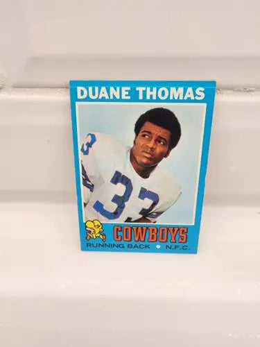Duane Thomas Dallas Cowboys trading card from 1971 Topps #65 in EX-NM condition
