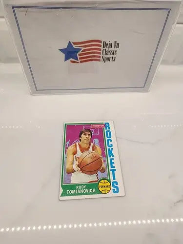 Rudy Tomjanovich basketball trading card from 1974-75 Topps series displayed in product