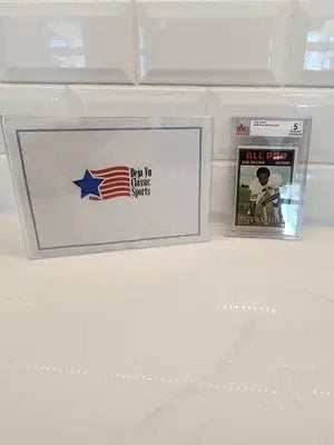Sports memorabilia featuring Paul Warfield BVG 5 collectible card showcasing Warfield BVG status