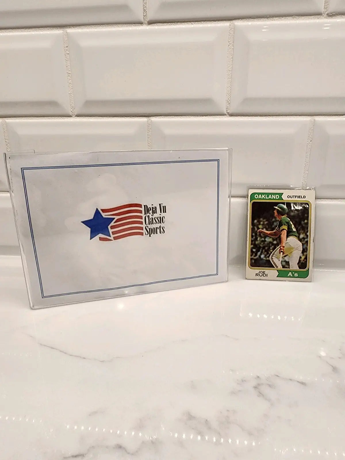 1974 Topps Joe Rudi sports trading card in protective case for collectible trading cards