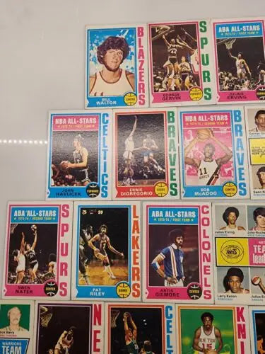 Vintage Topps basketball trading cards showcasing HOF superstars from basketball history