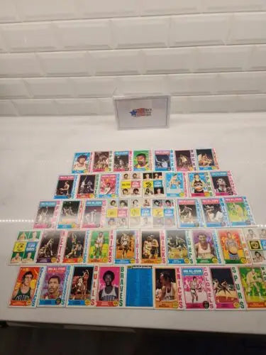 Collection of vintage Topps Basketball cards showcasing basketball history and HOF superstars