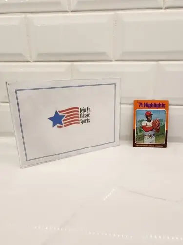 Trading card of Bob Gibson in protective case from 1975 Topps ’74 Highlights series