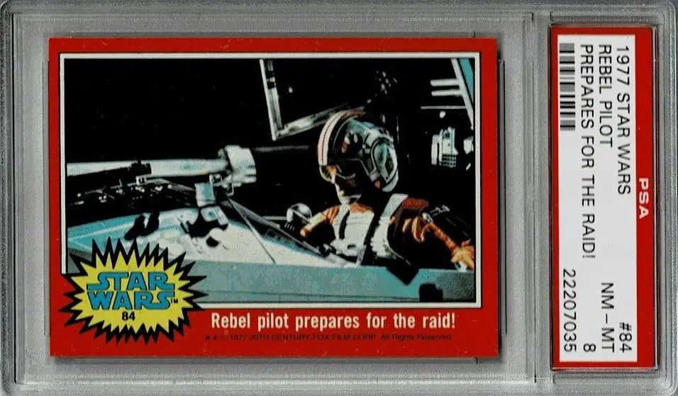 Graded 1977 Topps Star Wars Trading Card #84 Rebel Pilot Prepares for Raid PSA 8