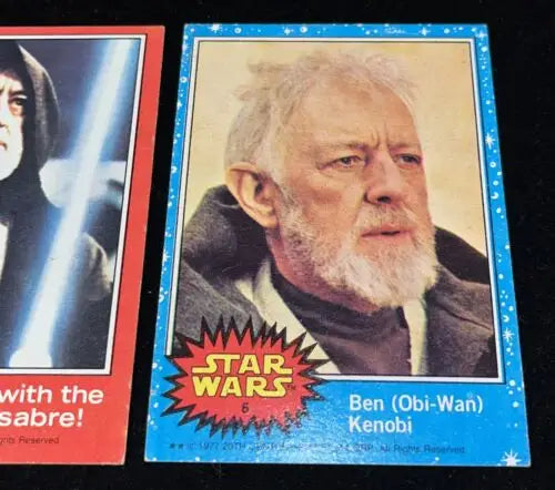Vintage Star Wars trading cards featuring Obi Wan Kenobi from 1977 Topps Series 1