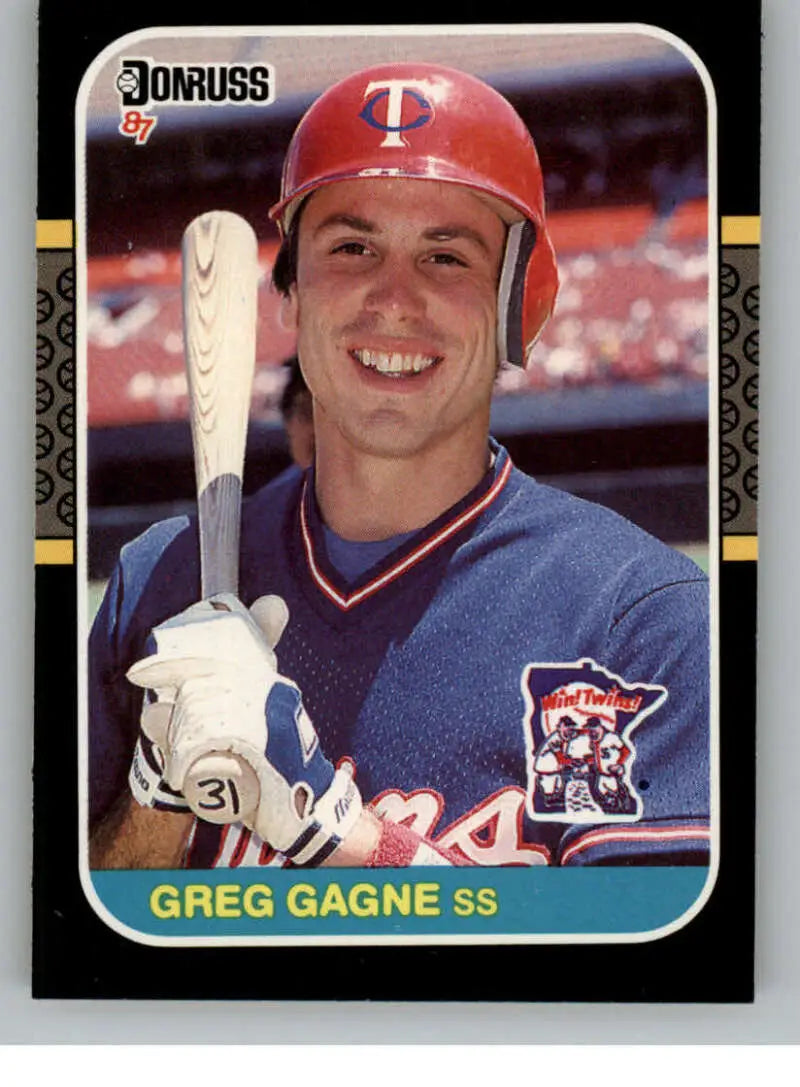 1987 Donruss #395 Greg Gagne baseball card featuring Minnesota Twins shortstop with bat