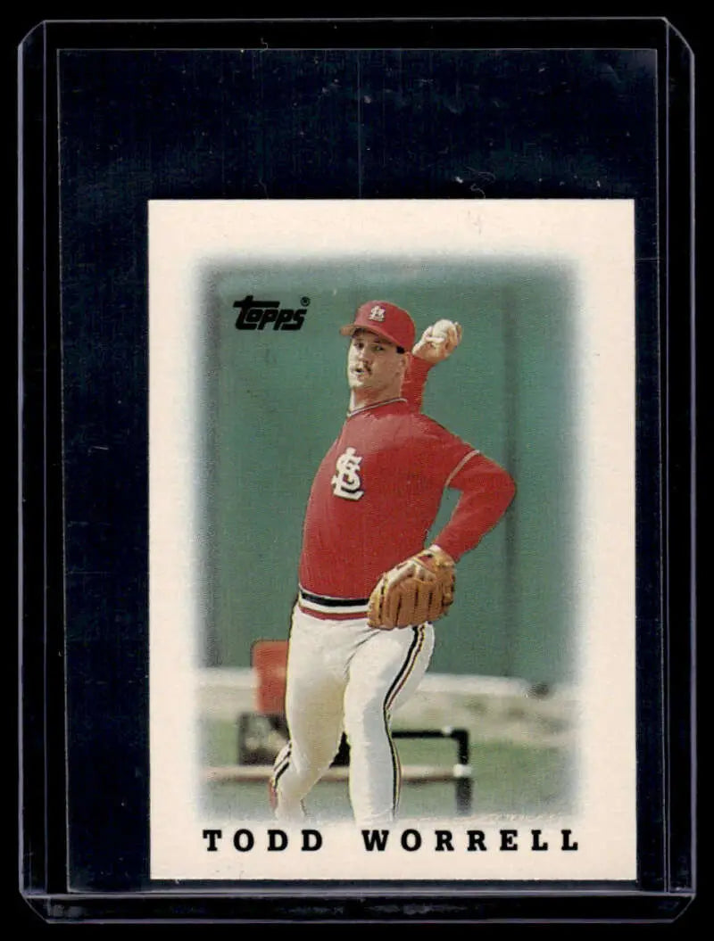 Baseball card of Todd Worrell in red uniform for St. Louis Cardinals Topps Major League