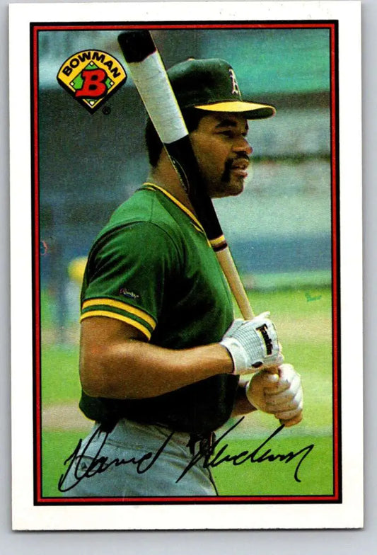 Dave Henderson in green Oakland Athletics uniform holding bat on 1989 Bowman baseball card