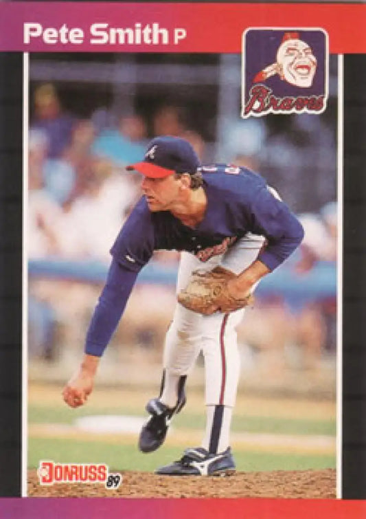 Baseball card of Pete Smith pitching in navy blue Atlanta Braves uniform