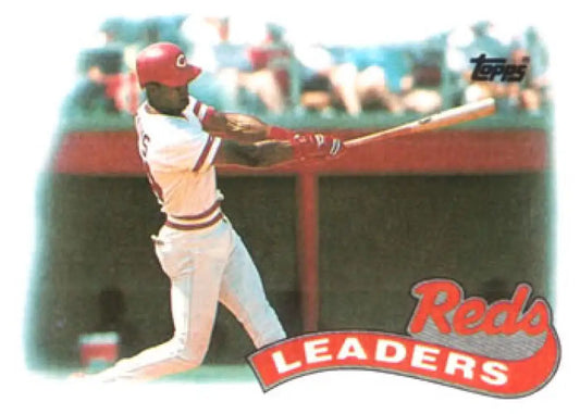 Baseball player Eric Davis in Cincinnati Reds uniform mid-swing at bat