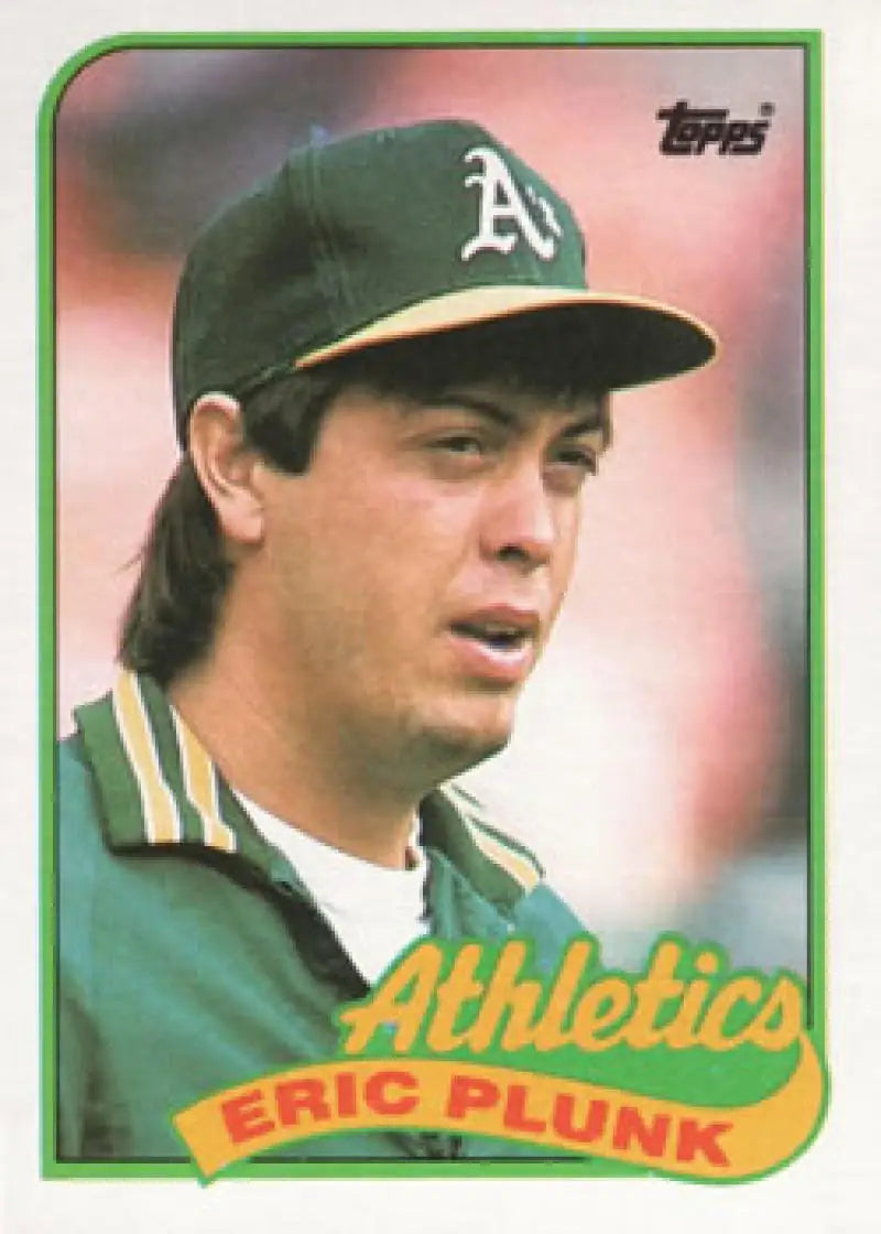 Baseball card of Eric Plunk in green uniform for Oakland Athletics 1989 Topps #448