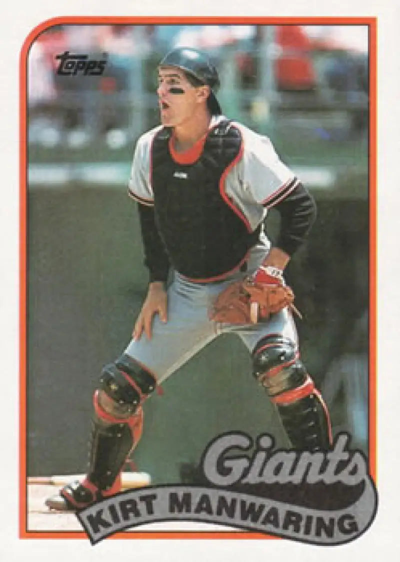 Kirt Manwaring baseball card featuring San Francisco Giants catcher in black and orange gear