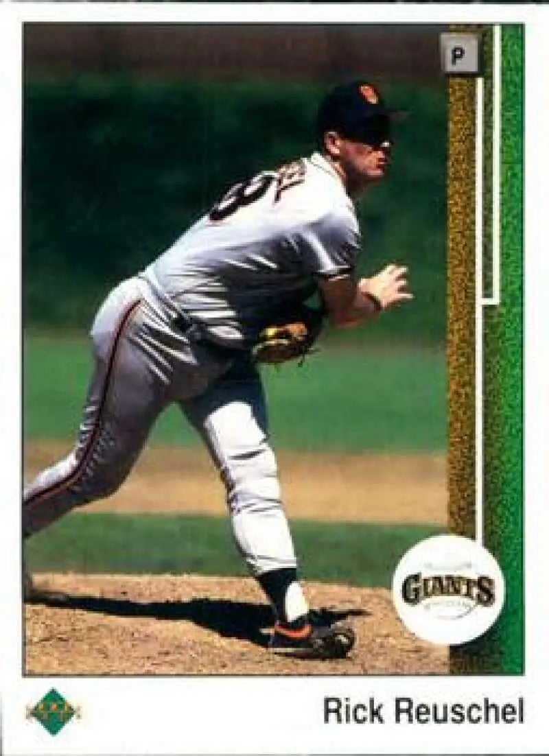 San Francisco Giants pitcher Rick Reuschel in delivery motion on baseball card