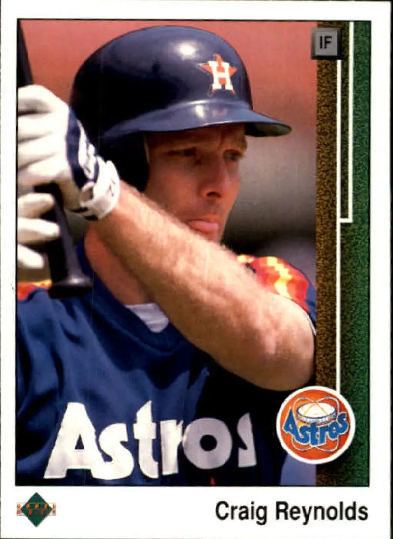 Baseball player in Houston Astros uniform ready to bat, featured on Craig Reynolds card