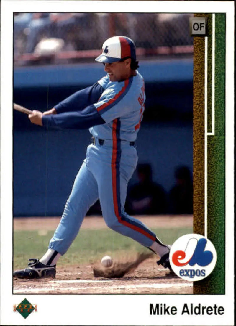 Baseball player in Montreal Expos uniform swinging bat on Upper Deck baseball card