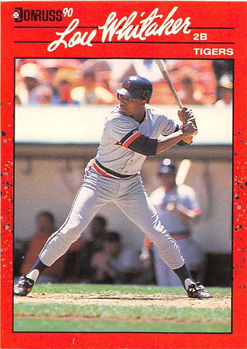 Red-bordered 1990 Donruss baseball card of Lou Whitaker, Detroit Tigers player at bat