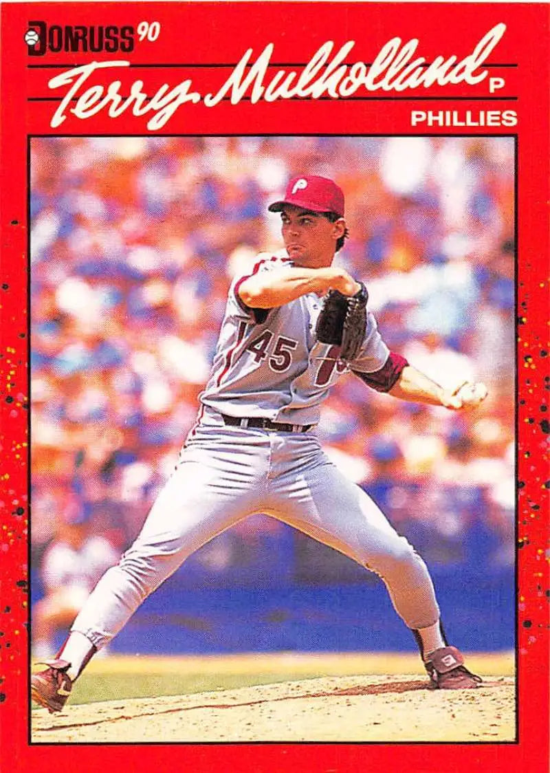 Red 1990 Donruss Terry Mulholland card featuring Philadelphia Phillies pitcher delivery
