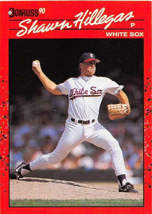 Baseball player in White Sox uniform mid-pitch on 1990 Donruss trading card