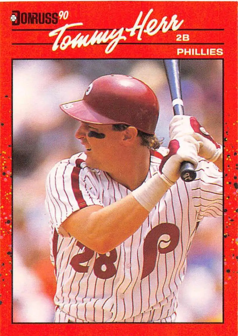 Red-bordered 1990 Donruss baseball card of Tom Herr in Phillies pinstripe uniform