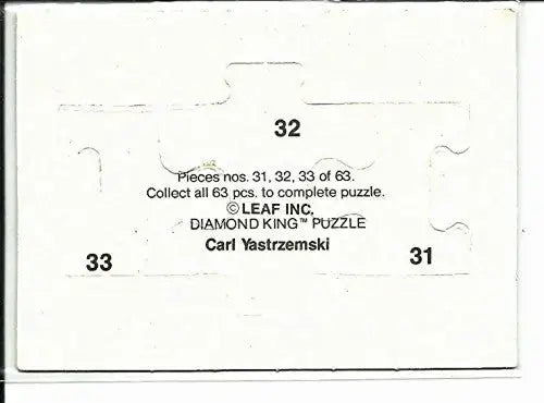 White jigsaw puzzle piece with cutouts for connection from Donruss Carl Yastrzemski puzzle