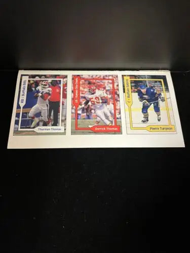 Three sports trading cards from the 1990 Pocket Price Guide Jerry Rice and others