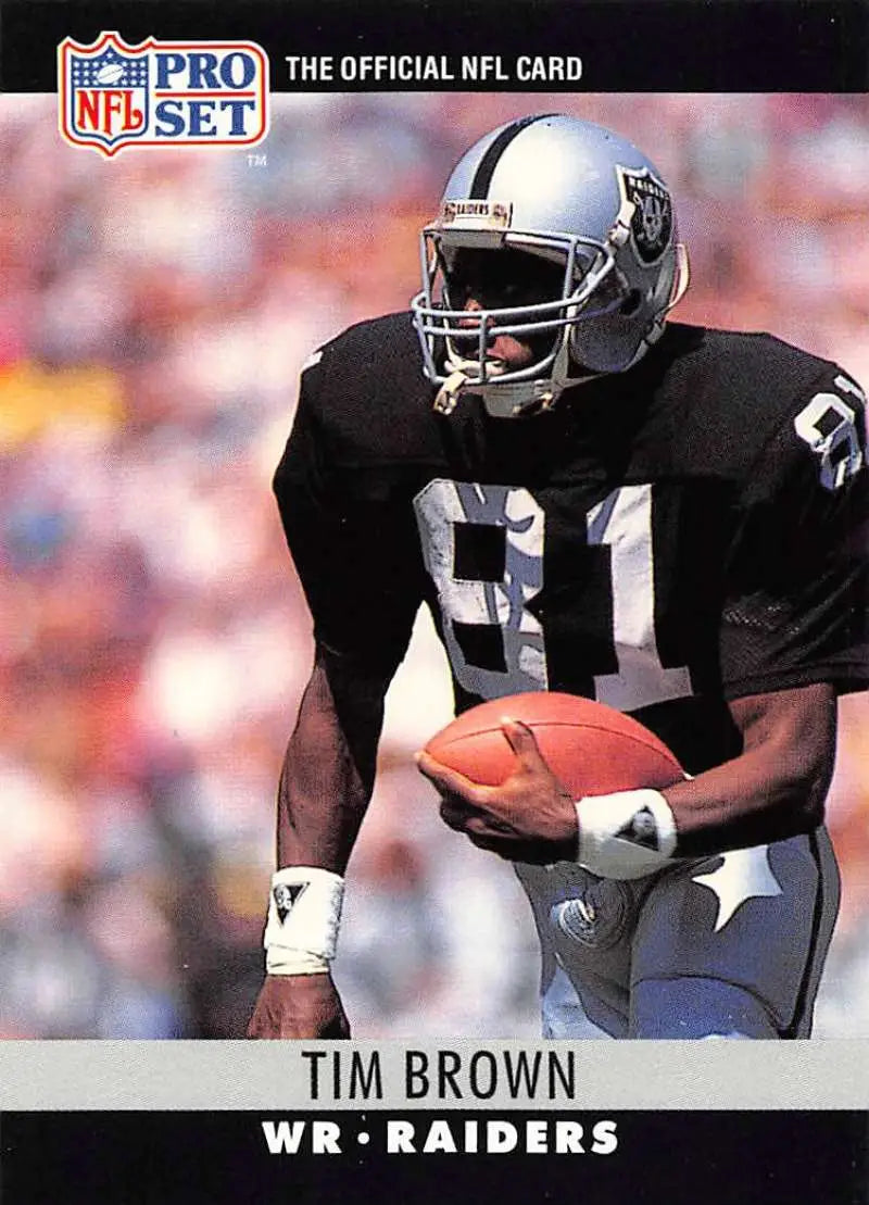 Tim Brown Los Angeles Raiders NFL Pro Set trading card in black uniform with football