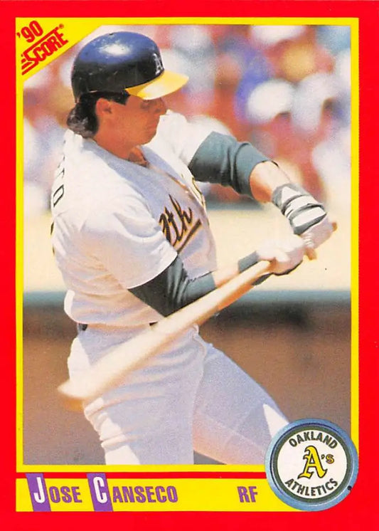Jose Canseco mid-swing in white uniform on 1990 Score Oakland Athletics baseball card