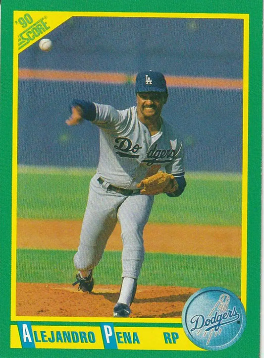 Baseball card of Alejandro Pena, Los Angeles Dodgers pitcher in mid-throwing motion