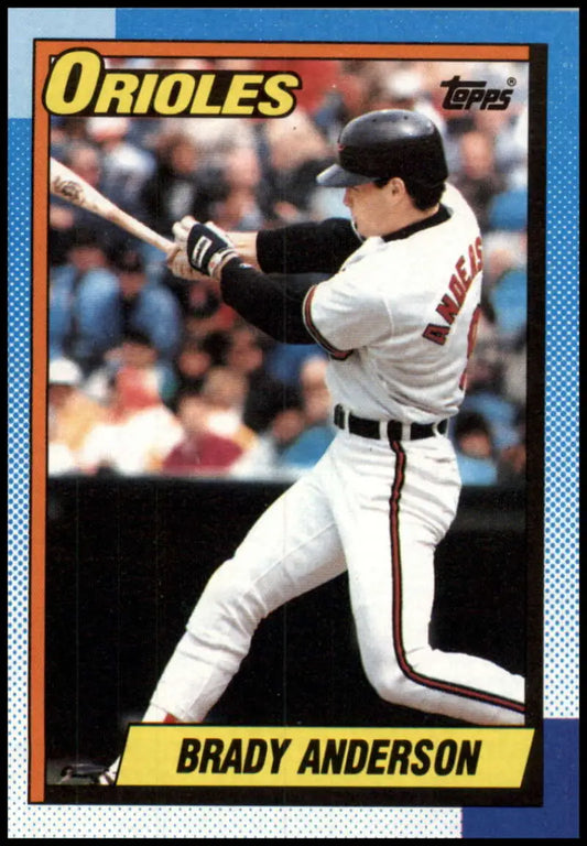 Brady Anderson in white uniform swinging on 1990 Topps Baltimore Orioles baseball card