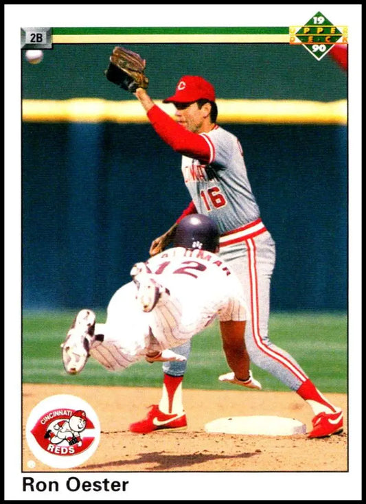 Cincinnati Reds player Ron Oester turns a double play in Upper Deck card image