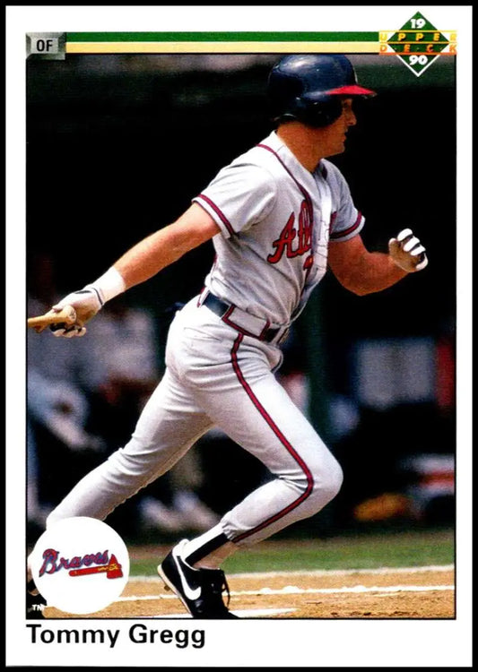Baseball player Tommy Gregg mid-swing in Atlanta Braves uniform for baseball card