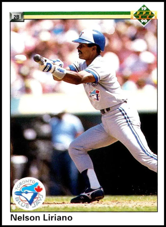 Nelson Liriano in Toronto Blue Jays uniform preparing to bunt for baseball card