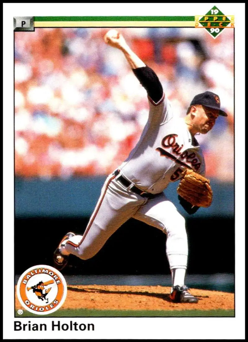 Baseball player Brian Holton in mid-pitch delivery on 1990 Upper Deck baseball card